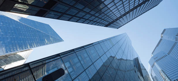 UK, London, directly below view of high rise office buildings in the city